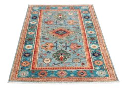 Surface texture of New Kazak rug with natural Wool and intricate pattern