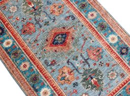 Central medallion detail of New Kazak rug from Pakistan