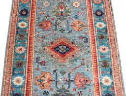 Close-up detail of New Kazak rug from Pakistan showing Wool weave