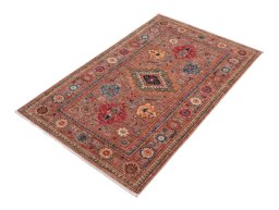 Corner detail of New Kazak rug showing border pattern and Wool pile
