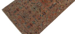 Backside of handmade New Kazak rug showing knot structure and weave density