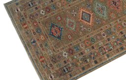 Backside of handmade New Kazak rug showing knot structure and weave density