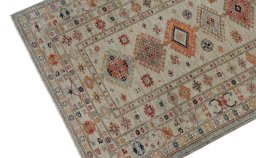 Backside of handmade New Kazak rug showing knot structure and weave density