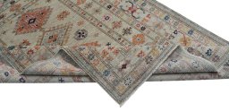 Central medallion detail of New Kazak rug from Pakistan