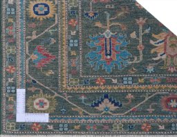 Corner detail of New Kazak rug showing border pattern and Wool pile