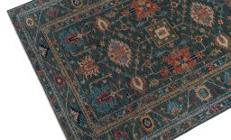 Backside of handmade New Kazak rug showing knot structure and weave density