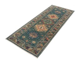 Corner detail of New Kazak rug showing border pattern and Wool pile