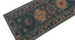 Backside of handmade New Kazak rug showing knot structure and weave density