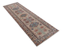 Close-up detail of New Kazak rug from Pakistan showing Wool weave
