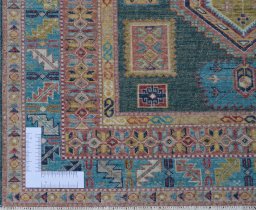 Corner detail of New Kazak rug showing border pattern and Wool pile