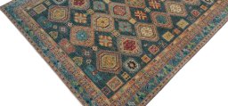 Backside of handmade New Kazak rug showing knot structure and weave density