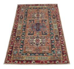 Surface texture of New Kazak rug with natural Wool and intricate pattern