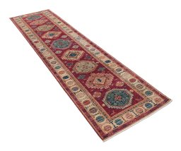 Corner detail of New Kazak rug showing border pattern and Wool pile