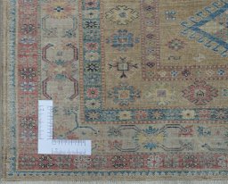 Corner detail of New Kazak rug showing border pattern and Wool pile