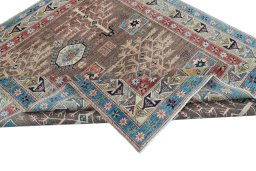 Central medallion detail of New Kazak rug from Pakistan