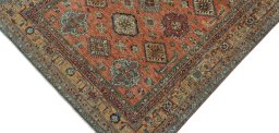 Backside of handmade New Kazak rug showing knot structure and weave density