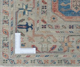 Corner detail of New Kazak rug showing border pattern and Wool pile