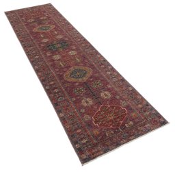 Corner detail of New Kazak rug showing border pattern and Wool pile