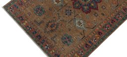 Backside of handmade New Kazak rug showing knot structure and weave density