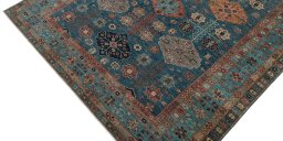 Backside of handmade New Kazak rug showing knot structure and weave density