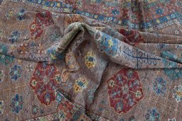 Full view of New Kazak rug from Pakistan, 378 × 279 cm in Beige tones
