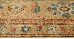 Corner detail of New Kazak rug showing border pattern and Wool pile