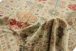 Backside of handmade New Kazak rug showing knot structure and weave density