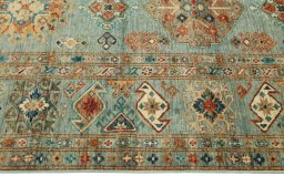Corner detail of New Kazak rug showing border pattern and Wool pile