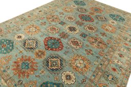 Full view of New Kazak rug from Pakistan, 373 × 273 cm in Blue tones
