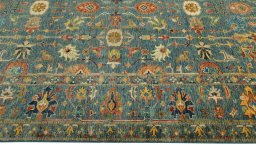 Full view of New Kazak rug from Pakistan, 310 × 247 cm in Blue tones