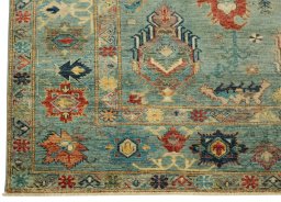 Corner detail of New Kazak rug showing border pattern and Wool pile