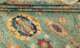 Close-up detail of New Kazak rug from Pakistan showing Wool weave