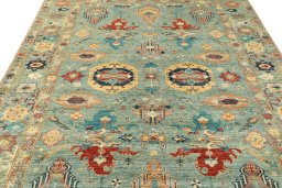 Backside of handmade New Kazak rug showing knot structure and weave density