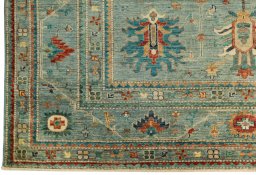 Corner detail of New Kazak rug showing border pattern and Wool pile