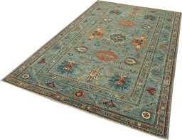Corner detail of New Kazak rug showing border pattern and Wool pile