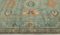 Full view of New Kazak rug from Pakistan, 306 × 204 cm in Blue tones