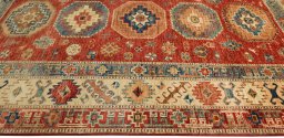 Close-up detail of New Kazak rug from Pakistan showing Wool weave