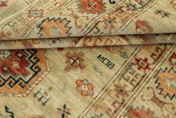 Corner detail of New Kazak rug showing border pattern and Wool pile