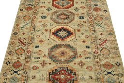 Backside of handmade New Kazak rug showing knot structure and weave density