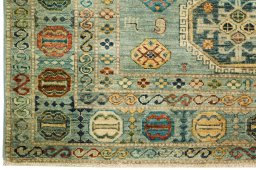 Corner detail of New Kazak rug showing border pattern and Wool pile
