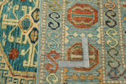 Surface texture of New Kazak rug with natural Wool and intricate pattern
