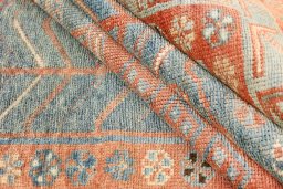 Corner detail of 1920s Oushak rug showing border pattern and Wool pile