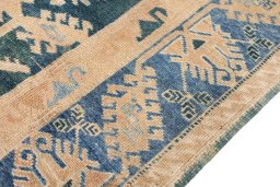 Central medallion detail of 1920s Oushak rug from Turkey