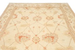 Backside of handmade New Oushak rug showing knot structure and weave density