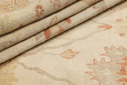 Full view of New Oushak rug from India, 364 × 282 cm in Beige tones