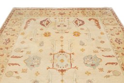 Backside of handmade 1990s Oushak rug showing knot structure and weave density