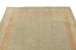 Surface texture of 1920s Oushak rug with natural Wool and intricate pattern