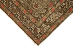Backside of handmade 1920s Shirvan rug showing knot structure and weave density