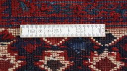 Full view of 1920s Sumakh rug from Iran / Persia, 231 × 150 cm in Dark blue tones