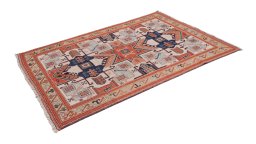 Corner detail of 1980s Sumakh rug showing border pattern and Wool pile